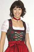 Traditionelles Dirndl mit roter Schürze